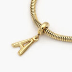 Dije Inicial Acero Inoxidable Tono Oro 0001