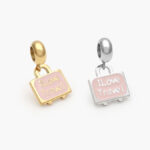Dije Acero Inoxidable Maleta Esmalte 584 - Oro
