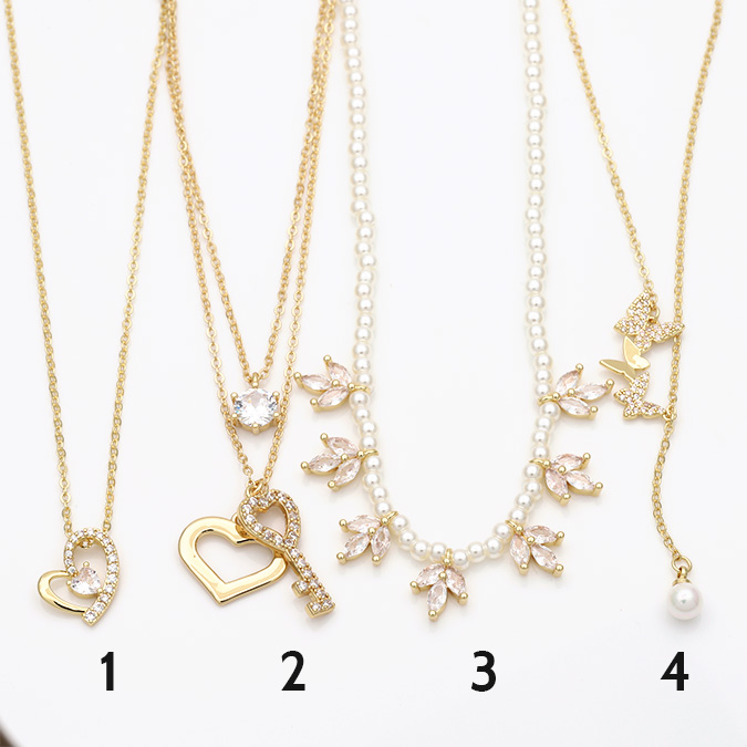 Collares-18 Collar Corazon Llave Flores Perlas Chapa de Oro Valdivia Accesorios 33-34 - Imagen 1