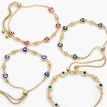 Pulso Corazones Ojos Turcos Rojos Negros Azules y Blancos Chapa de Oro 252