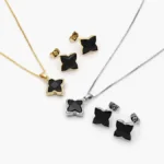 Juego Zirconia Flor Negra Chapa de Oro 86